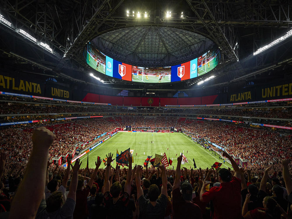 Fans of the MLS' Atlanta United wave banners at Mercedes-Benz Stadium in Atlanta, a likely venue for matches in the 2026 World Cup.