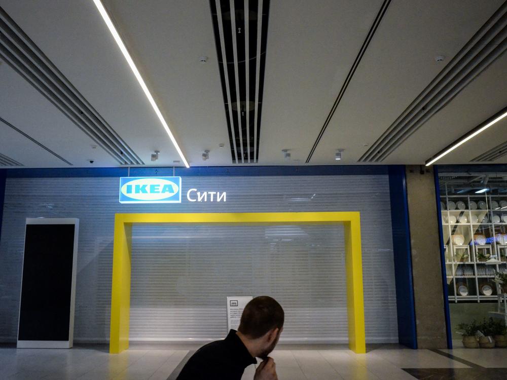 A man walks past the closed Ikea shop at a Moscow shopping mall on April 11.