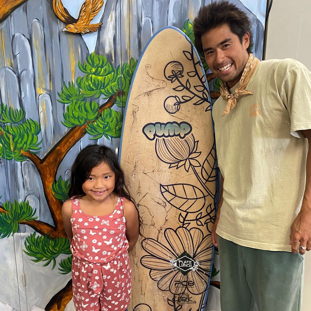 Kalelehua'aumoana Sales, who starts the second grade this fall at Fern Elementary School, got her first ever surfboard from Boards 4 Buddies. The board was donated by Chris Miyashiro, pictured above with Kalelehua'aumoana, in April.