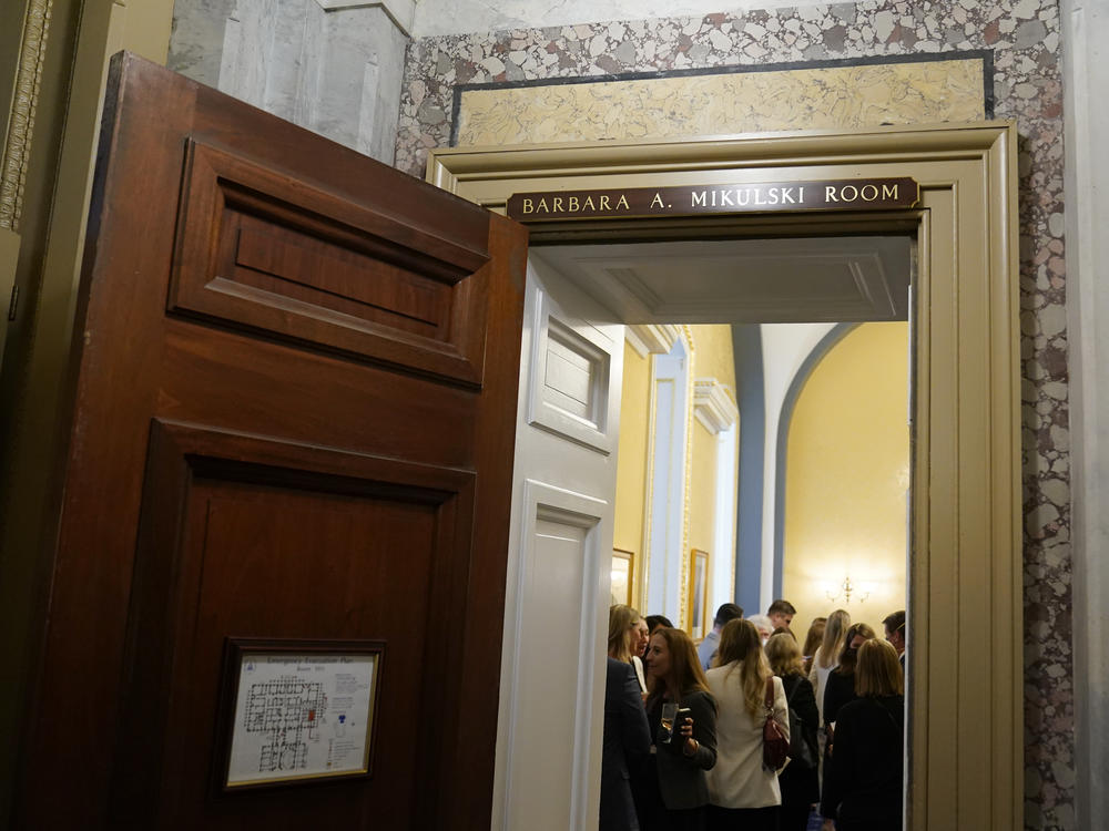 People attend a ceremony in a room dedicated to former Sen. Barbara Mikulski, D-Md., on Capitol Hill in Washington, D.C. on Wednesday. Another room was dedicated to the late former Sen. Margaret Chase Smith, R-Maine.