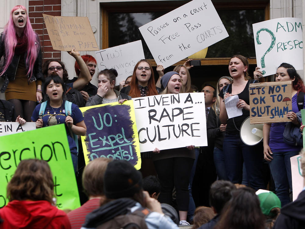 University of Oregon students and staff protest on campus in Eugene, Ore. in May of 2014, against sexual violence in the wake of allegations of rape brought against three UO basketball players by a fellow student.