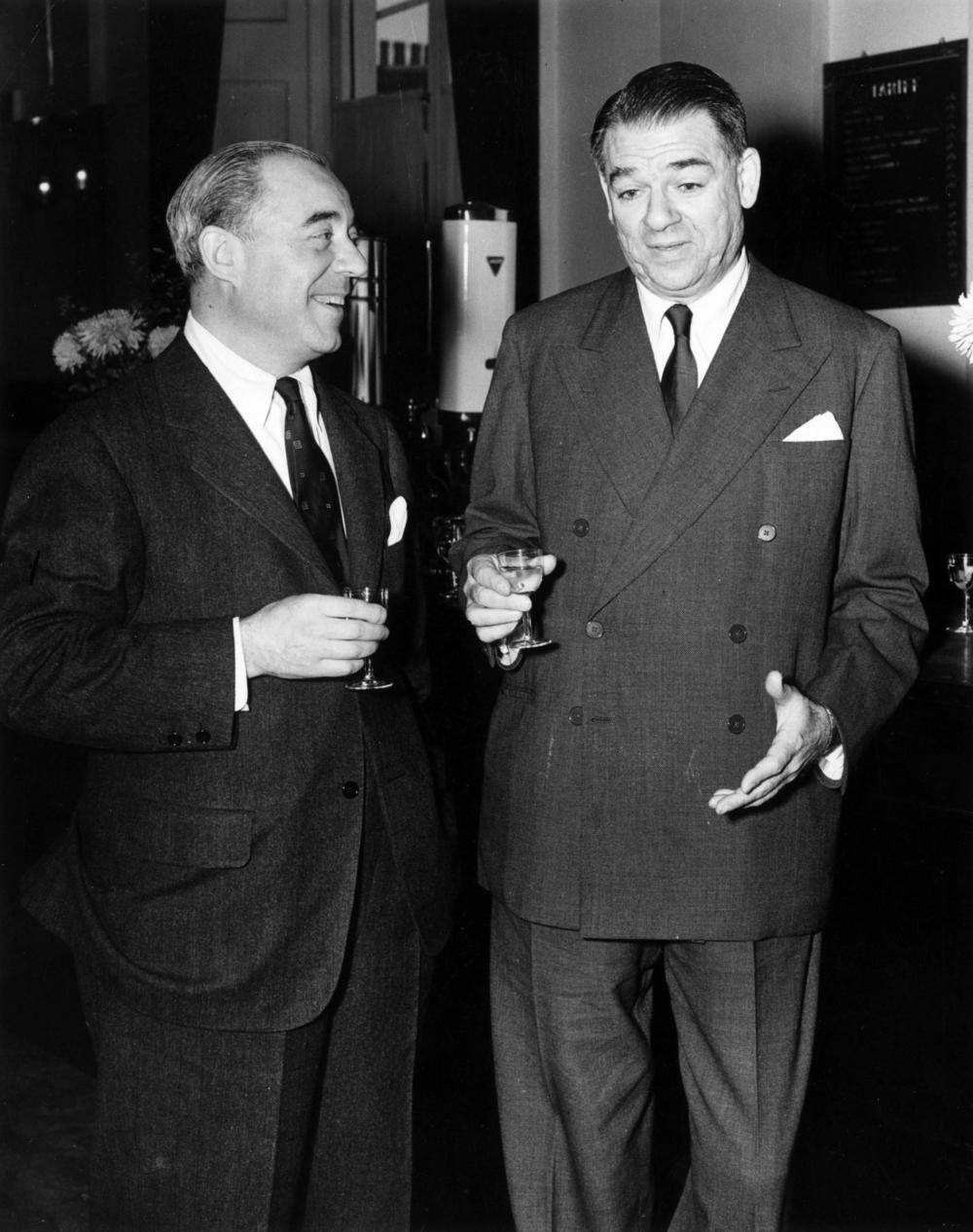Composer Richard Rodgers and lyricist-librettist Oscar Hammerstein in London in October 1951, before a performance of <em>South Pacific</em>.
