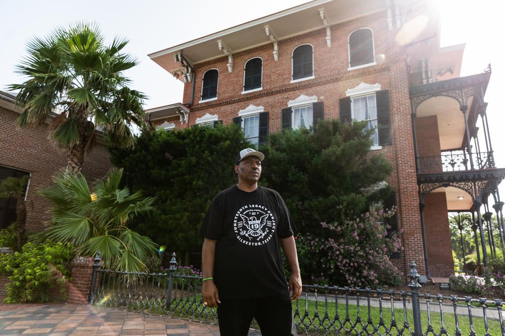Sam Collins poses for a portrait at the historic home, Ashton Villa.