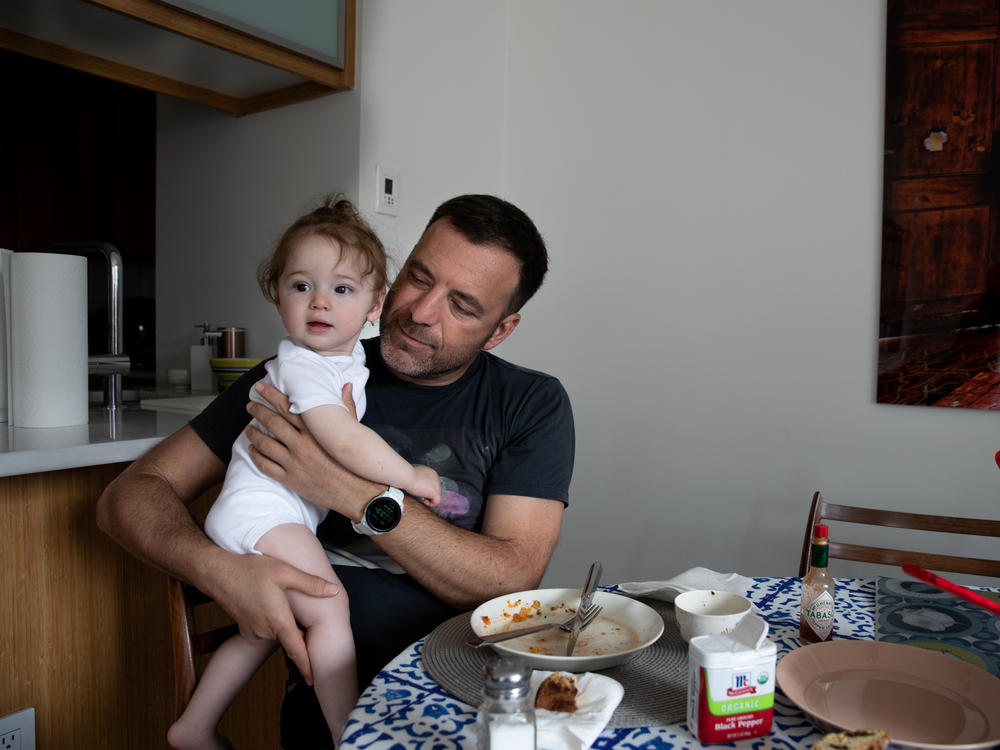 Cenk Bulbul, a single dad by choice, with his youngest daughter Gaia Bulbul in New York, NY. Cenk had both his daughters via the same surrogate using donor eggs and his sperm to make the embryos that were implanted.