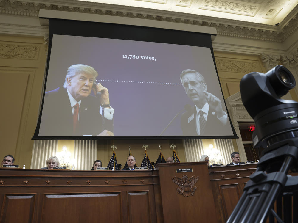 A transcript of a phone call between former U.S. President Donald Trump and Brad Raffensperger, Georgia secretary of state, appears on a video screen during a hearing on the Jan. 6 investigation on Tuesday in Washington.