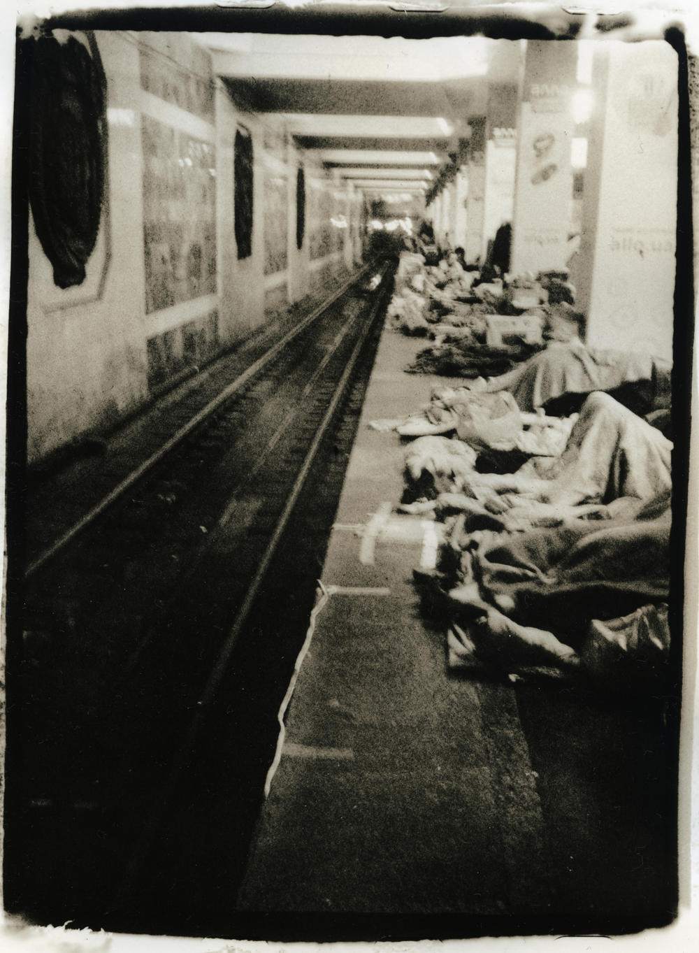 Refugees shelter in a subway station in Kharkiv, Ukraine, in April.