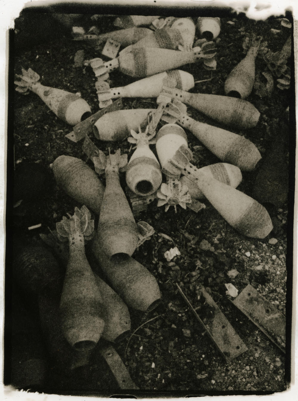 Shells sit in a pile in Mala Rohan,  a village on the outskirts of Kharkiv, Ukraine, in 2022.