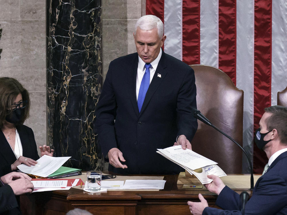 Proposed changes to the Electoral Count Act would clarify the vice president's role in counting states' electoral votes. Here, then-Vice President Mike Pence is seen in the House chamber early on Jan. 7, 2021, to finish the work of the Electoral College after a mob loyal to President Donald Trump stormed the Capitol.