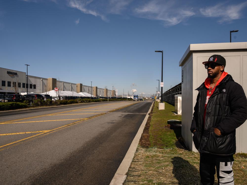 Amazon Labor Union president Chris Smalls waits as workers cast their votes over whether or not to unionize in an election held outside an Amazon warehouse in Staten Island on March 25, 2022.