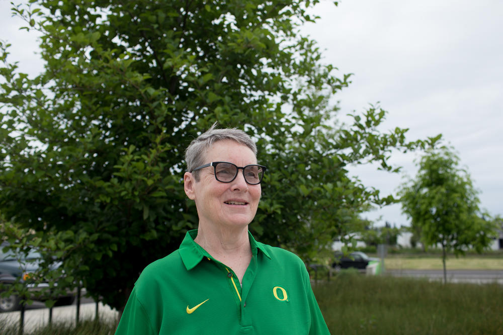 Peg Rees led the physical education department at the University of Oregon for decades. Now retired, she announces play-by-play commentary for UO home softball games.