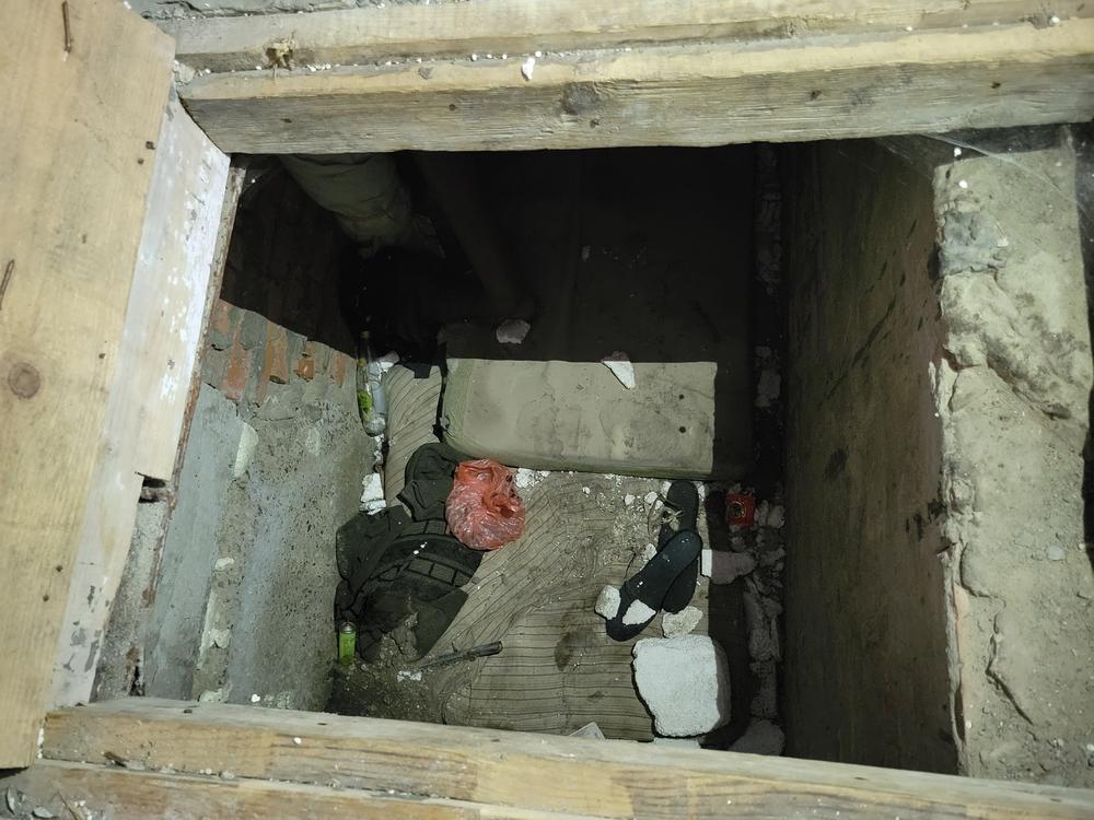 Viktoria Andrusha is believed to have been held in an abandoned building in her village. She would have been on the first level. Two other male prisoners shared this crawl space below.