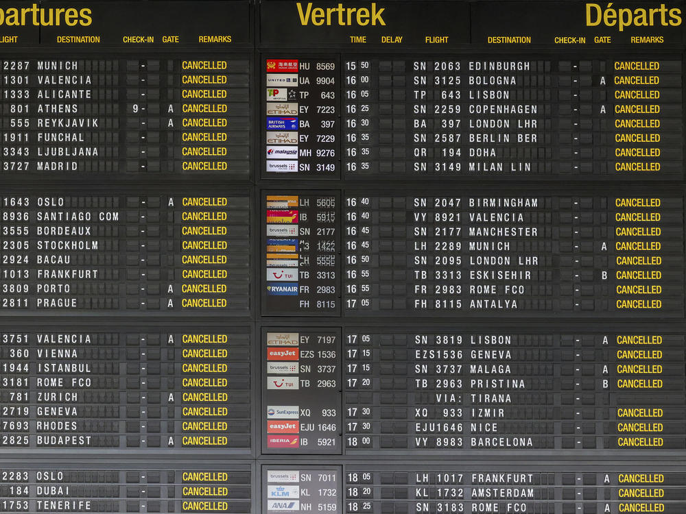A departures board with cancelled flights in the departures hall at Brussels international airport during a general strike in Brussels, Monday, June 20, 2022.