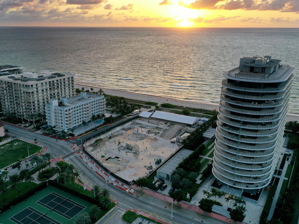 In an aerial view, a cleared lot where the 12-story Champlain Towers South condo building once stood is seen on June 22, 2022 in Surfside, Florida. This week marks the first anniversary of the tragic event where 98 people died when the building partially collapsed.