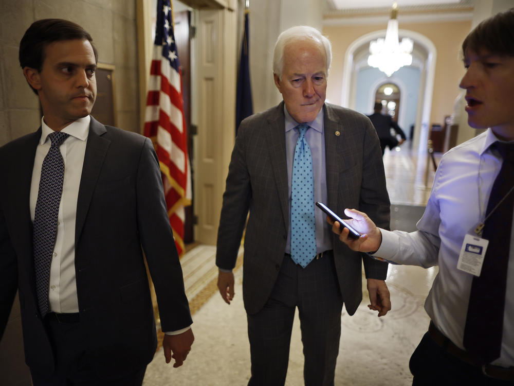 Senate Minority Whip John Cornyn of Texas, the lead Republican negotiator, talks to reporters after giving a speech in support of the Bipartisan Safer Communities Act at the Capitol on Wednesday.