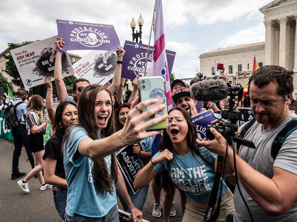 Pro-life protesters celebrate in D.C. following the court's decision to overturn Roe v. Wade.