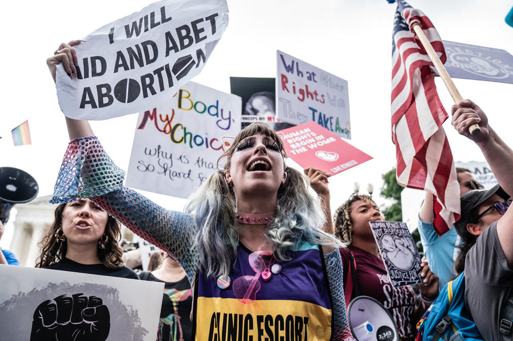 Abortion-rights supporters await the decision at the Supreme Court.