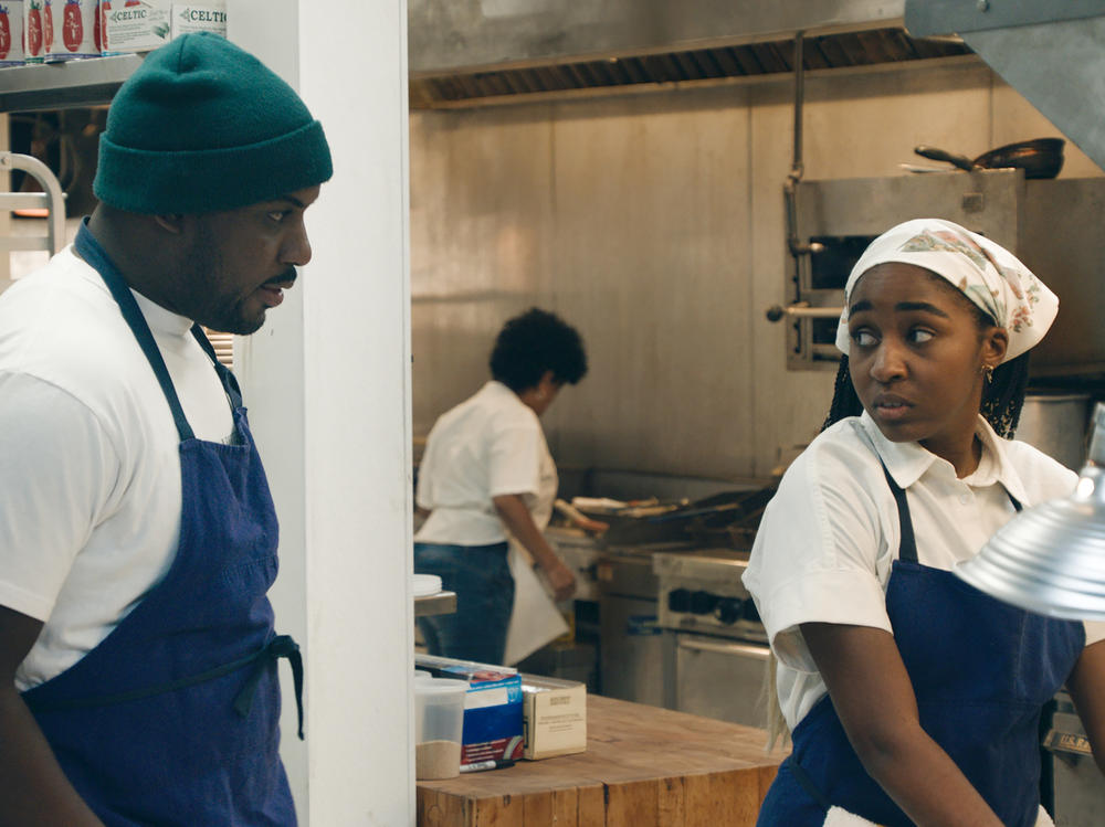 Lionel Boyce as Marcus and Ayo Edebiri as Sydney on the new FX show <em>The Bear. </em>