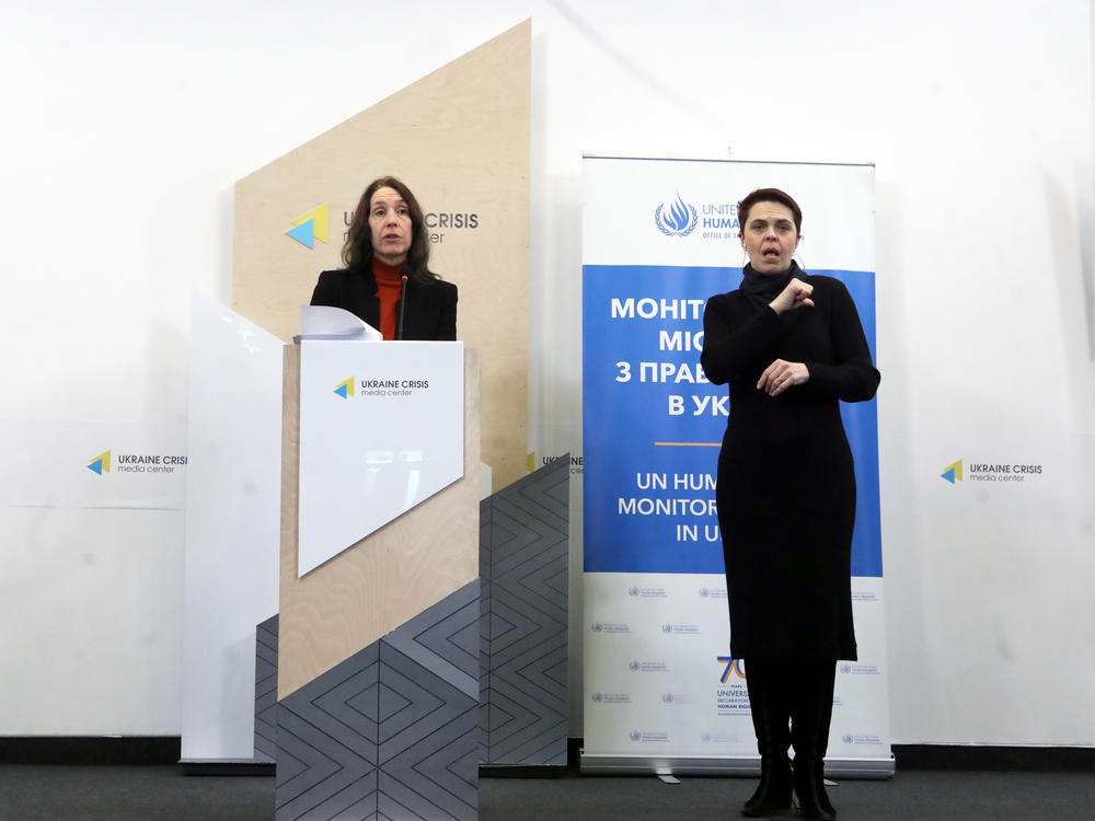 Head of the U.N. Human Rights Monitoring Mission in Ukraine, Matilda Bogner (left), presents a report at the Ukraine Crisis Media Center, in Kyiv, Ukraine.