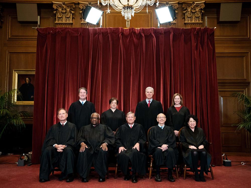 A group photo of the justices at the Supreme Court in Washington on April 23, 2021. Seated from left: Samuel Alito, Clarence Thomas, John Roberts, Stephen Breyer and Sonia Sotomayor. Standing from left: Brett Kavanaugh, Elena Kagan, Neil Gorsuch and Amy Coney Barrett.