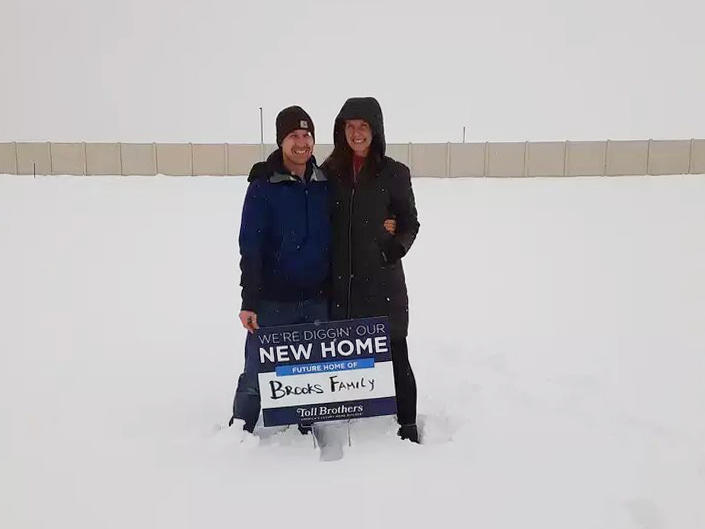 Ari and TR Brooks stood on the land where their new home would be built the day they agreed to buy it back in February of 2021. But the home is still not completed and mortgage rates have risen dramatically.