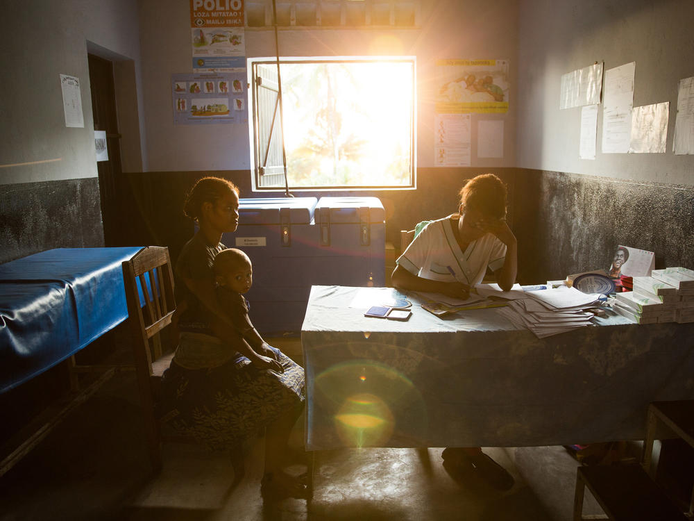 A patient talks with a nurse at a traveling contraception clinic in Madagascar run by MSI Reproductive Choices, an organization that provides contraception and safe abortion services in 37 countries. The group condemned the overturn of <em>Roe v. Wade</em> and warned that the ruling could stymie abortion access overseas.