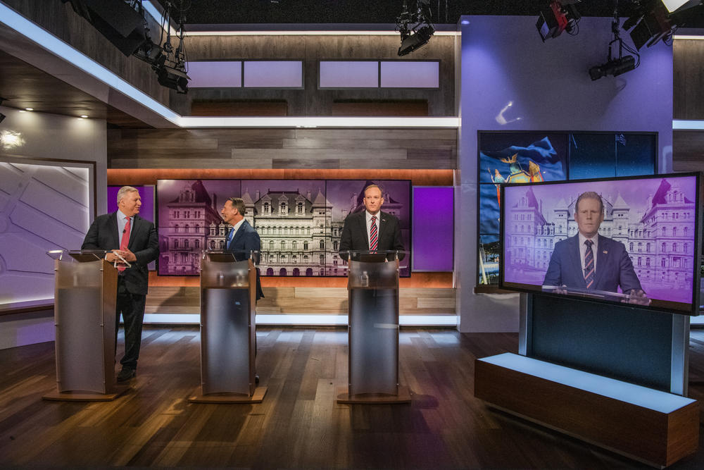 Businessman Harry Wilson, former Westchester County Executive Rob Astorino, U.S. Rep. Lee Zeldin and Andrew Giuliani, a former Trump Administration aide who is the son of former New York City Mayor Rudy Giuliani, face off during New York's Republican gubernatorial debate on June 20, 2022, in New York.