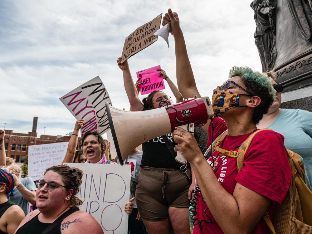 Abortion rights protesters in Louisville, Ky., after the Supreme Court announced it had voted to overturn <em>Roe v. Wade</em>. On Monday, abortion rights advocates filed a lawsuit arguing that the Kentucky state constitution protects the right to abortion.