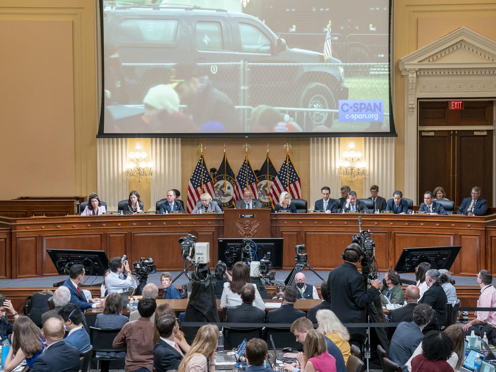 A video of then-President Donald Trump's motorcade leaving the Jan. 6 rally on the Ellipse is displayed as Cassidy Hutchinson, a former top aide to then-White House Chief of Staff Mark Meadows, testifies about Trump's actions on that day.