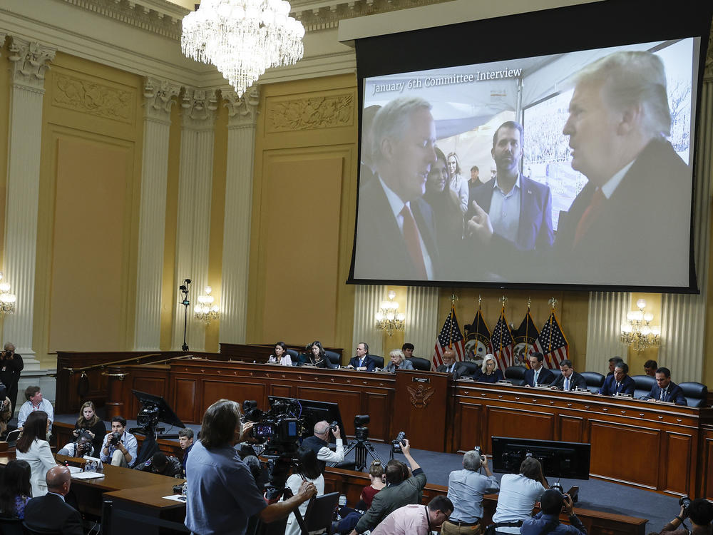 An image of former President Donald Trump talking to his Chief of Staff Mark Meadows is displayed as Cassidy Hutchinson, a former top aide to Meadows, testifies about events around the Capitol insurrection to the House Jan. 6 select committee.