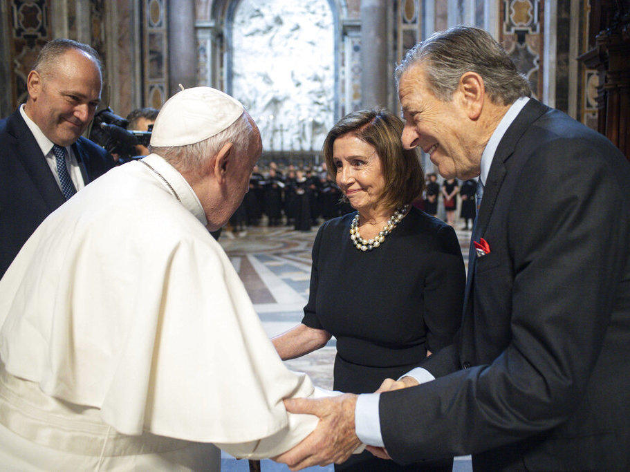 Pope Francis greets Speaker of the House Nancy Pelosi, D-Calif., and her husband, Paul, on Wednesday before celebrating a Mass on the Solemnity of Saints Peter and Paul in St. Peter's Basilica at the Vatican. Pelosi received Communion during the papal Mass, witnesses said, despite her position in support of abortion rights.