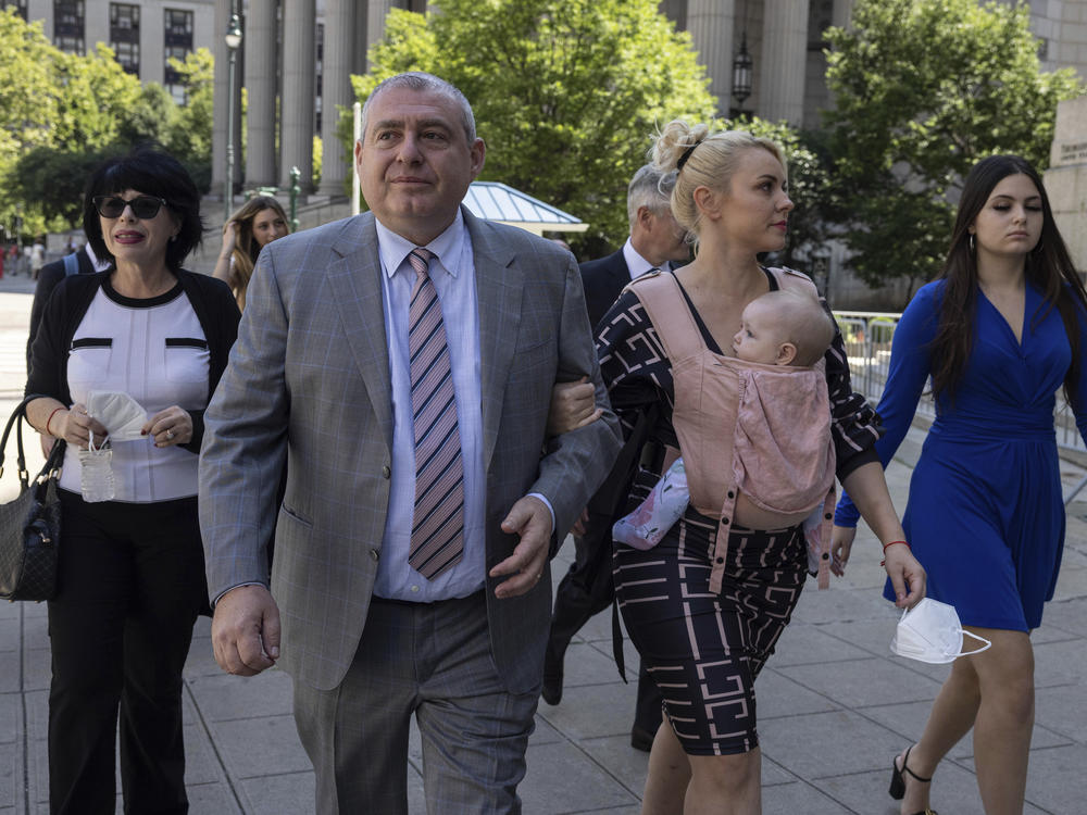 Lev Parnas, a former associate of Rudy Giuliani, arrives at the federal courthouse in New York with his wife Svetlana Parnas on Wednesday.