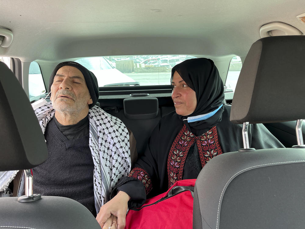 Yousef Al-Kurd and his wife, Fayeza, on their way to a West Bank hospital.