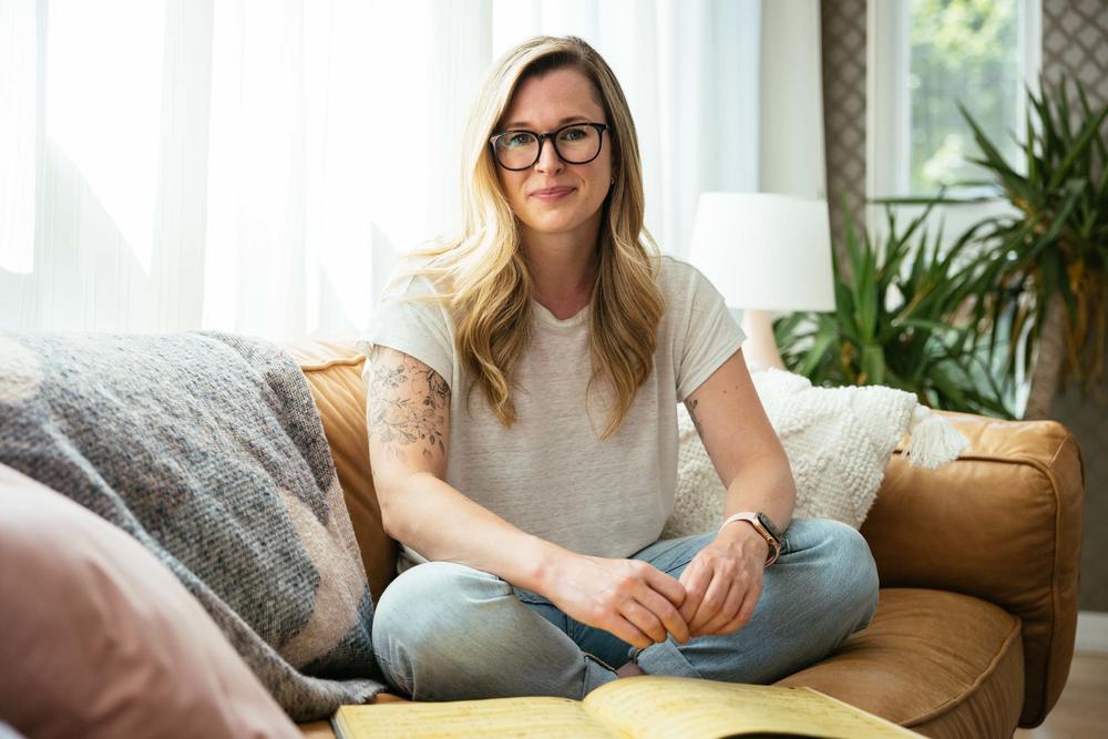 Software engineer Carla Stickler sits with her 