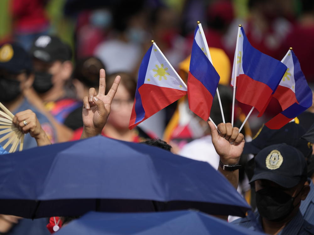 Supporters of President-elect Ferdinand 