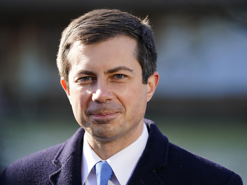 Transportation Secretary Pete Buttigieg listens at an event in Philadelphia, on Jan. 14, 2022.