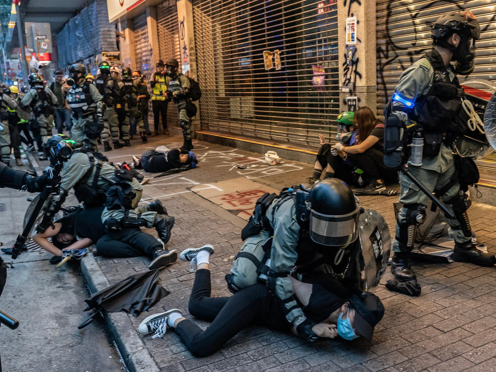 Pro-democracy protesters are arrested by police during a clash at a demonstration in Wan Chai district on October 6, 2019 in Hong Kong.