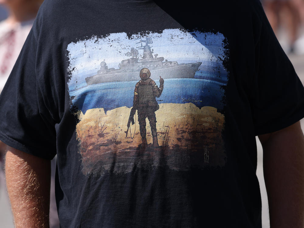 A T-shirt, worn at a Berlin rally this month to support European aid to Ukraine, celebrates the Ukrainian soldiers on Snake Island who refused to surrender to Russian naval forces.