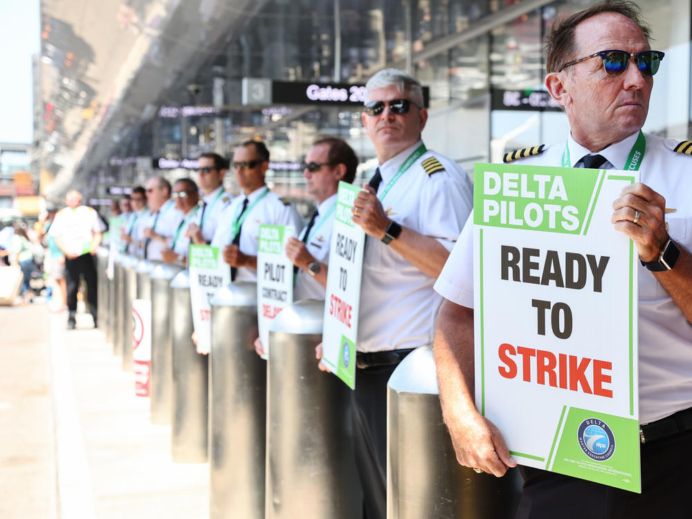 Delta Air Lines pilots picket at Los Angeles International Airport during a protest held at airports across the country, on Thursday in Los Angeles, California.