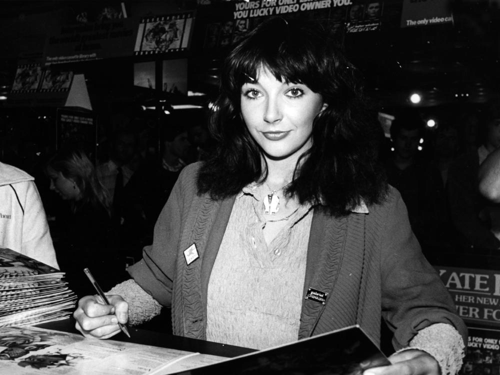 Kate Bush signing records in 1980.