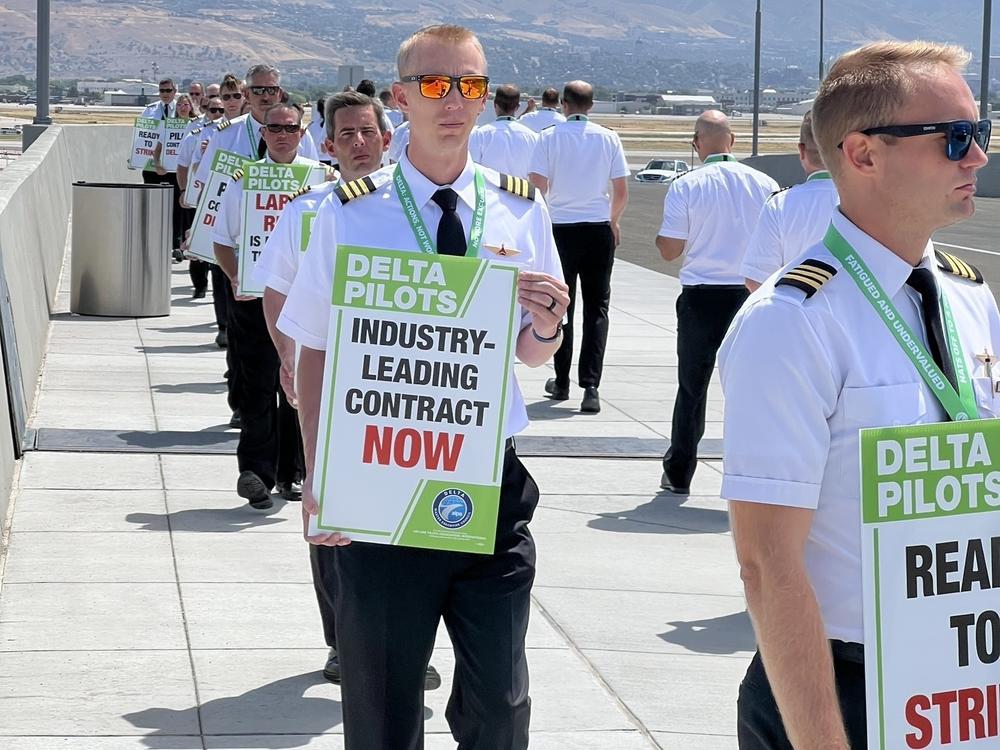 Delta pilots engaged in demonstrations at seven airports around the U.S. on Thursday calling for higher pay, among other things. This photo was taken at Salt Lake City International Airport.