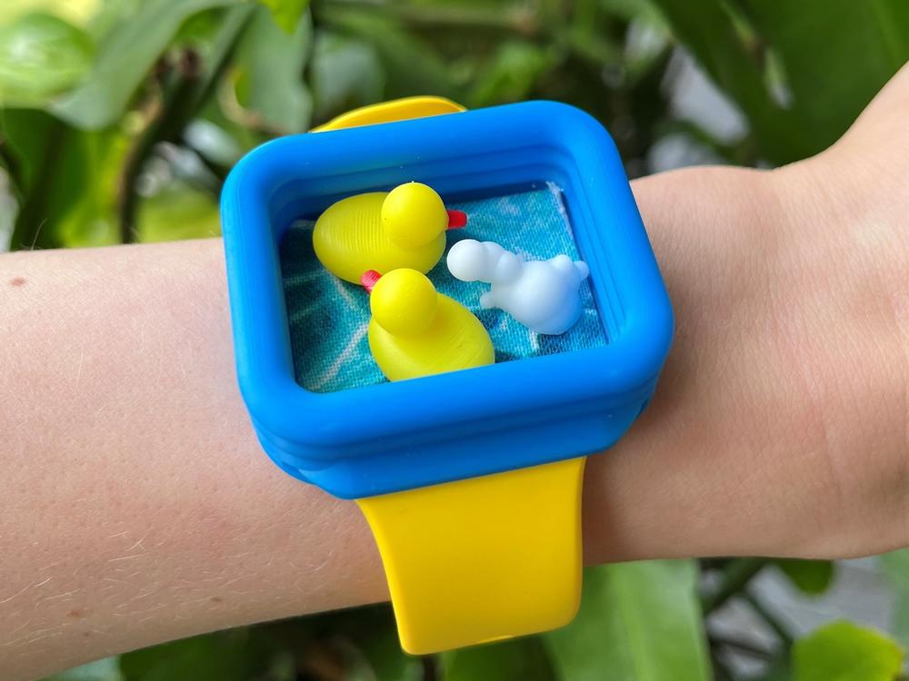 When you check one of the watches made by Kevin Bertolero, you'll find tiny magnetic ducks instead of the time.