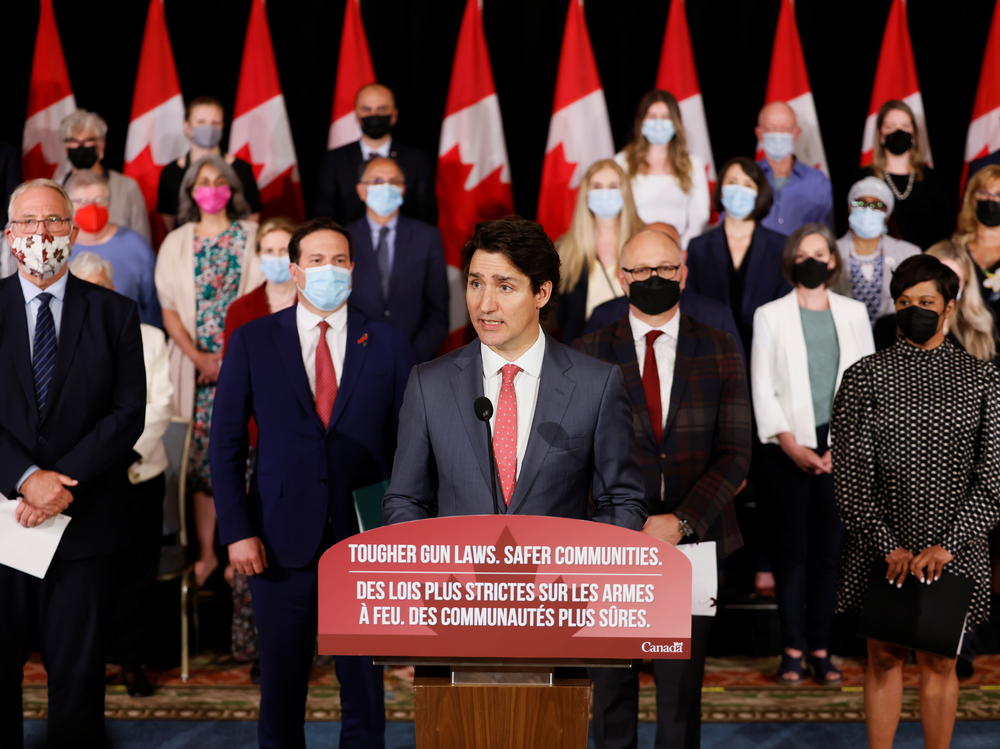 Canada's Prime Minister Justin Trudeau, with government officials and gun control advocates, speaks at a news conference on May 30 about firearm-control legislation that was tabled in the House of Commons in Ottawa, Ontario, Canada.