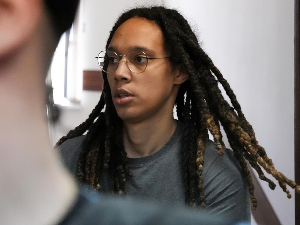 WNBA star and two-time Olympic gold medalist Brittney Griner is escorted to a courtroom for a hearing, in Khimki just outside Moscow, Russia, Monday, June 27, 2022.