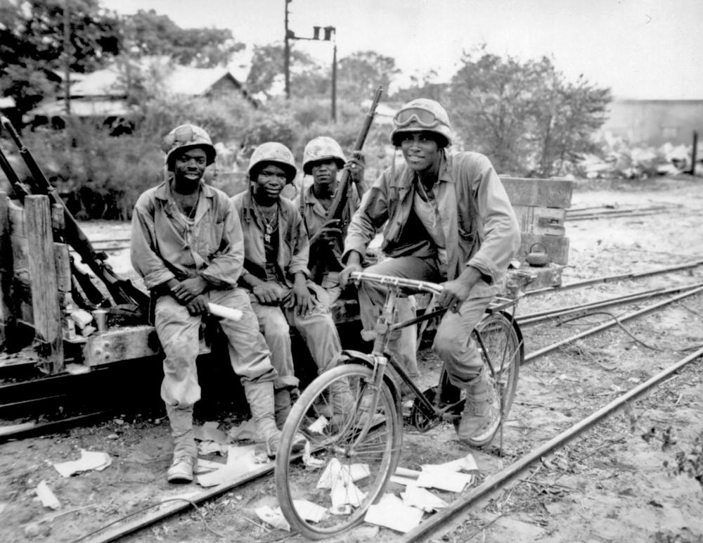 Montford Point Marines relaxing from their jobs with the 3rd Ammunition Company in Saipan circa 1944.