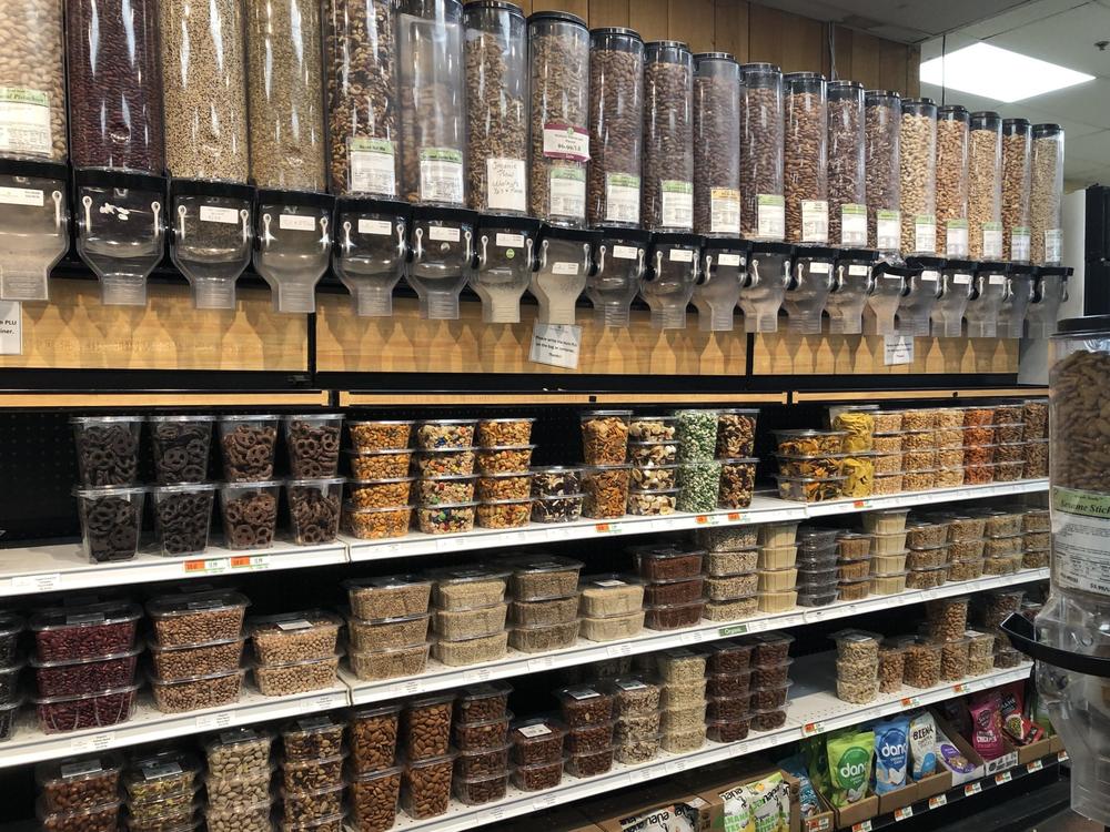Nuts and dried fruit items at a grocery store.