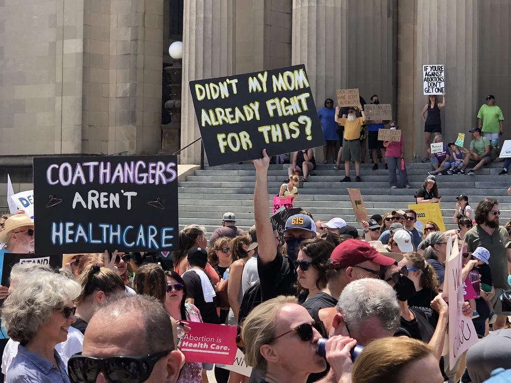 References to coat hangers have been used to protest the decision to overturn <em>Roe v. Wade</em>. Abortion rights activists say 