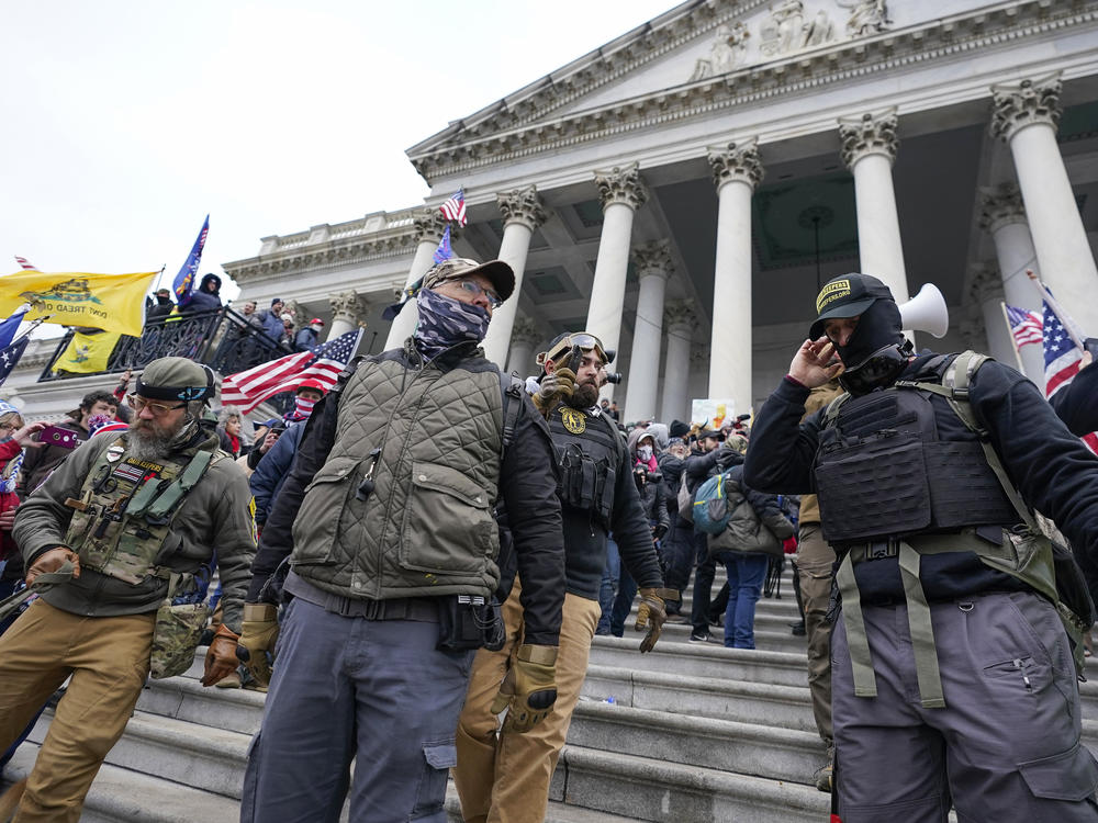 Members of the Oath Keepers at the U.S. Capitol on Jan. 6, 2021, in military-style attire. One-in-five of those charged during the attack on the Capitol were veterans, which leaves some veterans worried about how that will affect how the public views them.