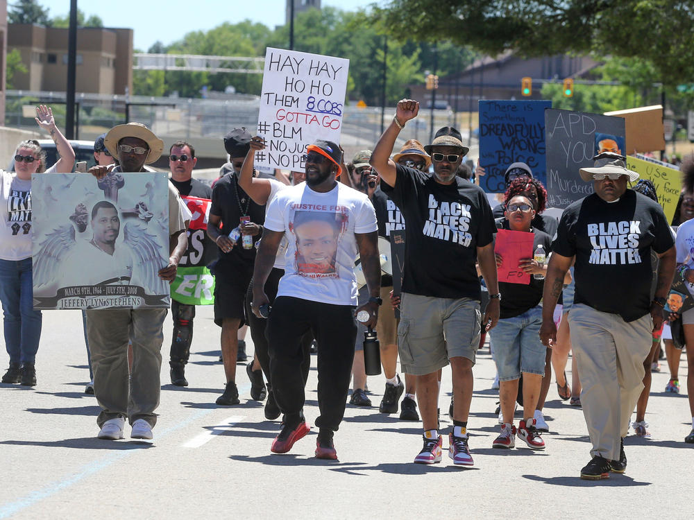 Protesters march along South High Street on Saturday in Akron, Ohio, calling for justice for Jayland Walker after he was fatally shot by police.