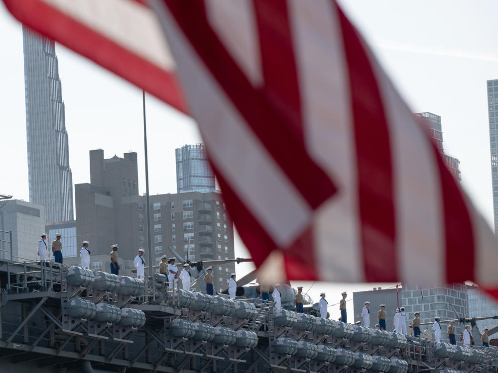 Marines and Navy sailors from the USS Bataan stand on the flight deck during their arrival for Fleet Week 2022 in New York. In the wake of the Supreme Court's historic term, some service members and veterans are speaking out.