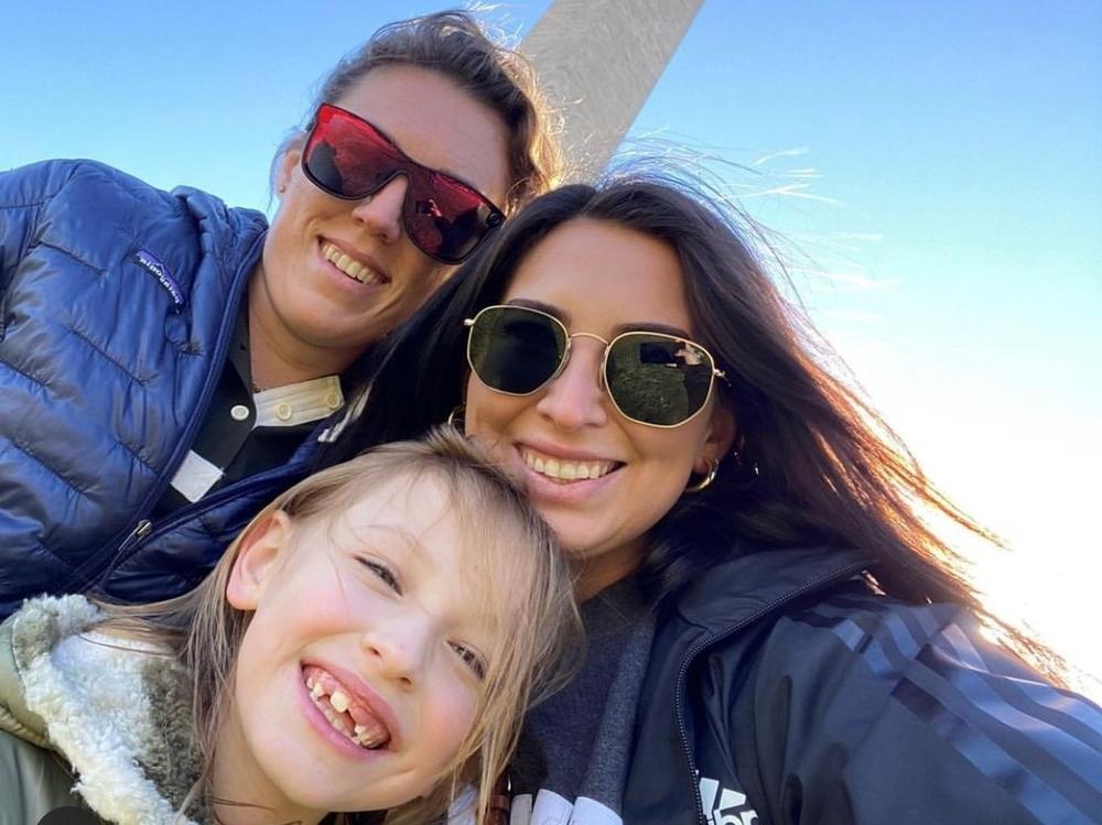 Meleah Martin, left, her girlfriend, Katelyn Carbajal, right, and Carbajal's daughter Harper, center, in Washington, D.C.